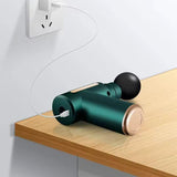 Mini pistola de massagem com botão e 4 cabeças.